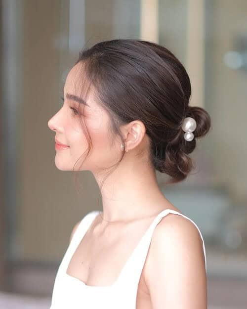 Semi-messy Low Bun with Pearl Accessory