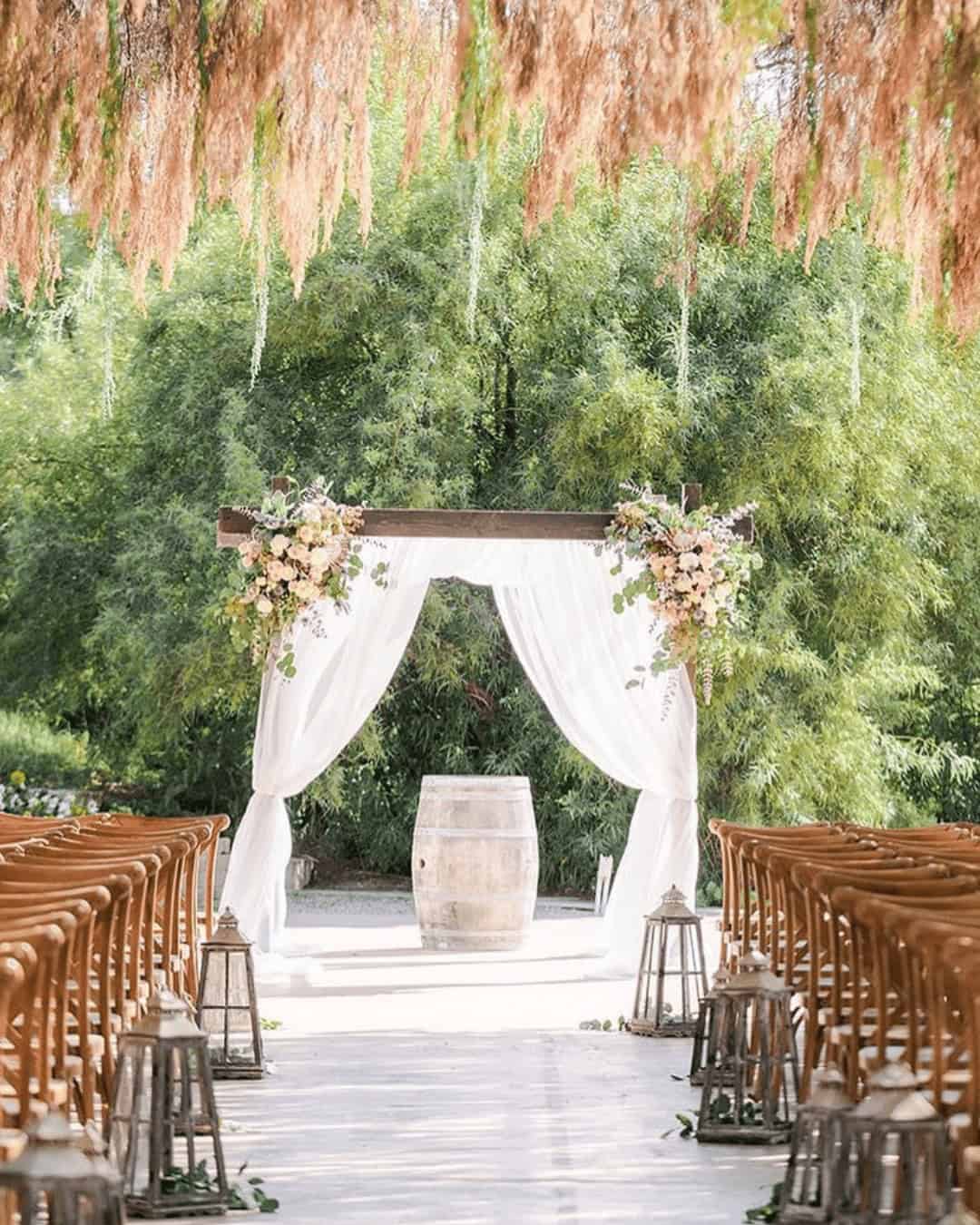 Romantic Decor With Barrels For The Wedding Ceremony