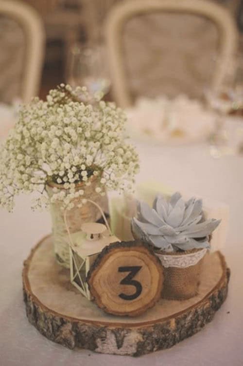 Baby’s breath and succulent table pieces