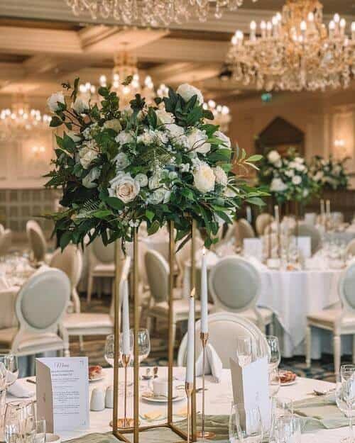 Tiered bouquets with gold stands