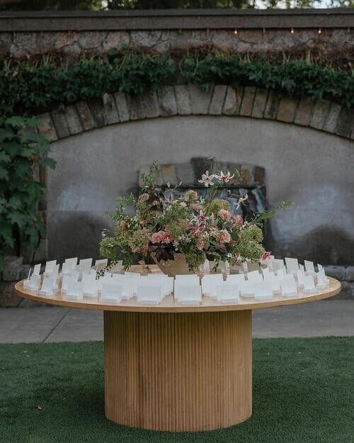 Greenery on the seating card table