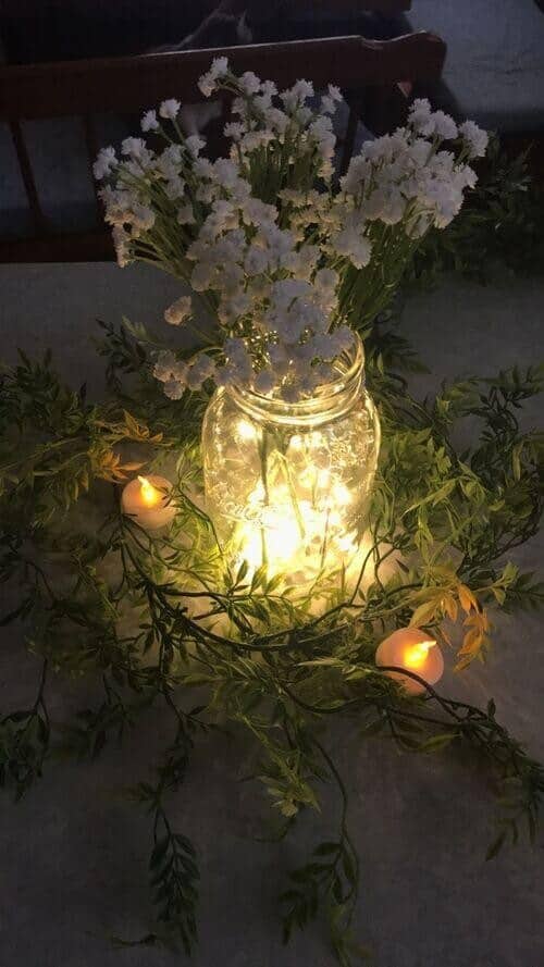 Baby’s breath and fairy light lanterns