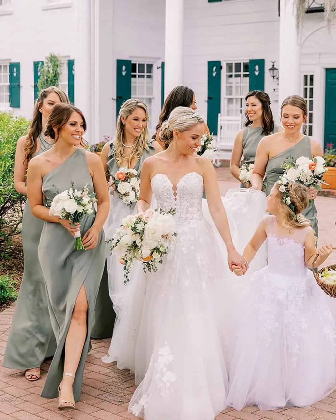 Bridesmaids With A Flower Girl