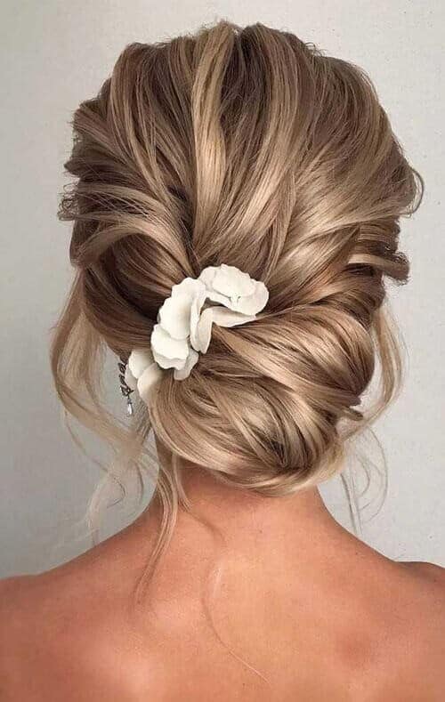 Messy low bun with florals