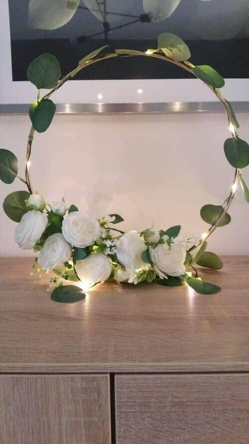 Greenery and fairy lights wrapped