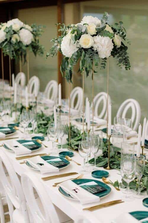 Greenery table runners and sea blue plates