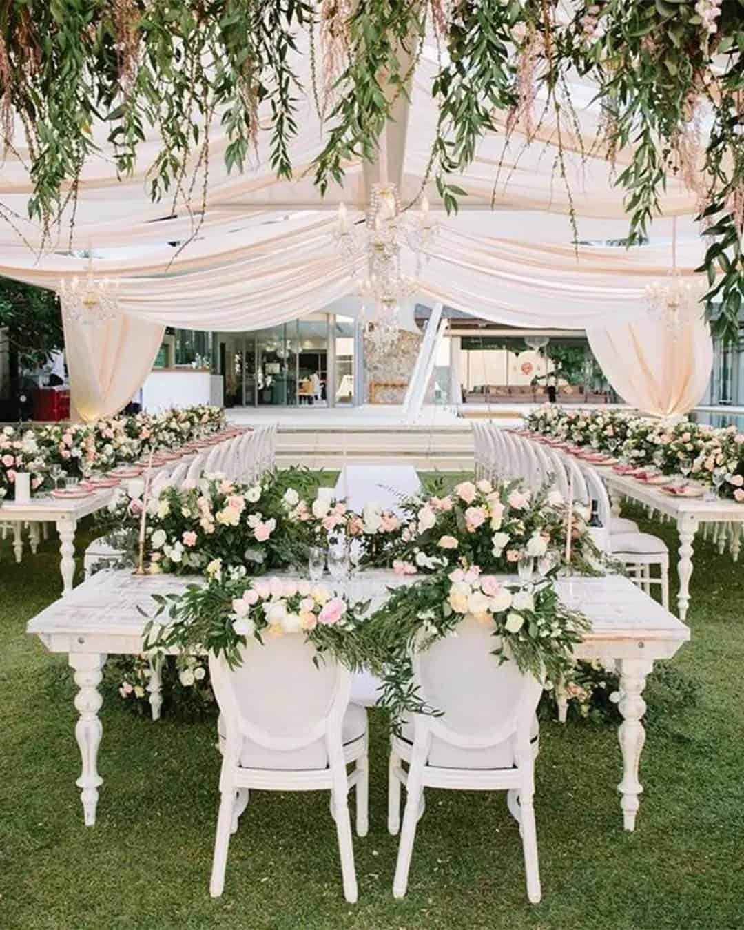 Wedding Tent Decorated With Natural Greenery