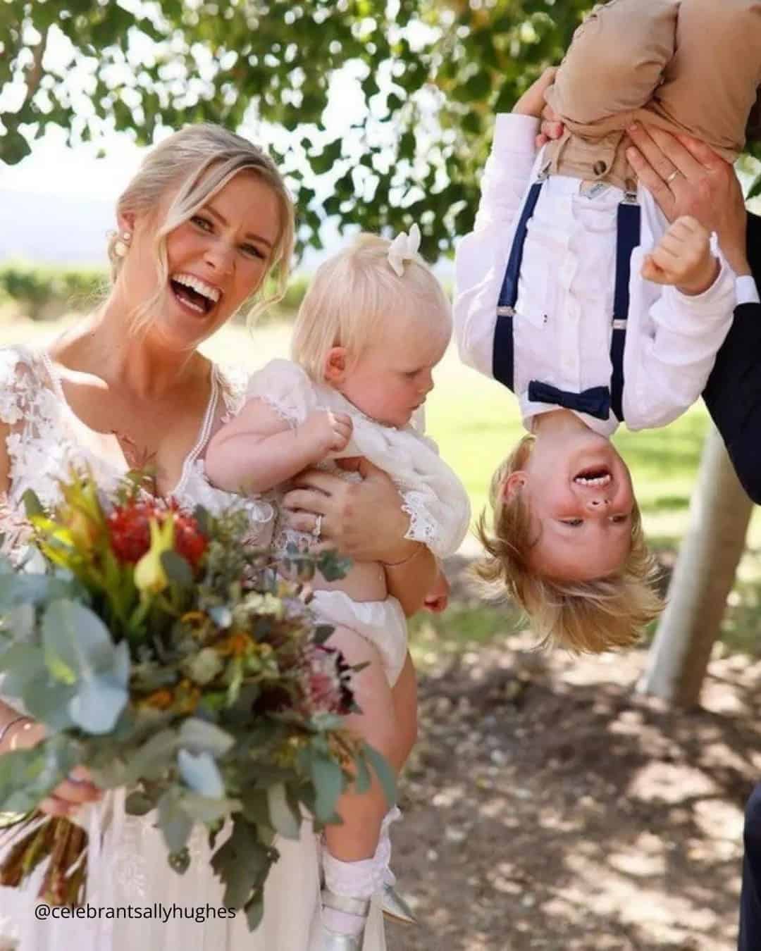 Bride and groom with nieces, nephews, or young relatives