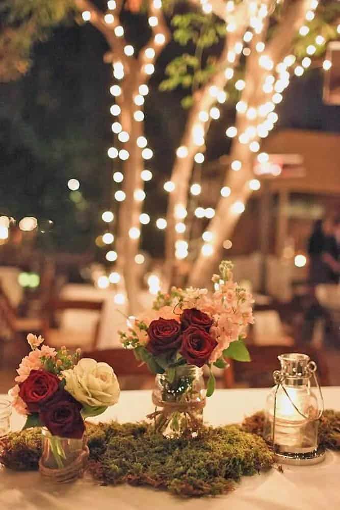 Floral Centerpieces With Moss and Greenery