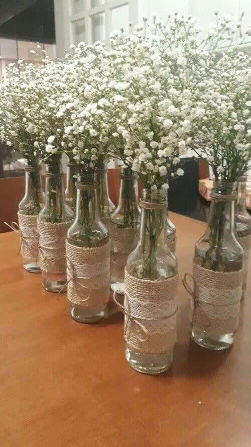 Baby’s breath in wine bottles