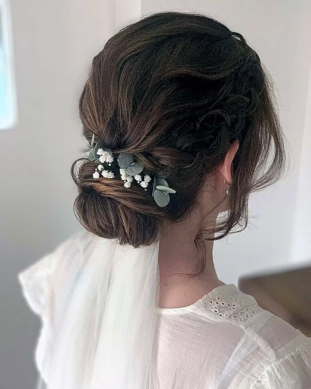 Bridal Look with Veil and Flowers