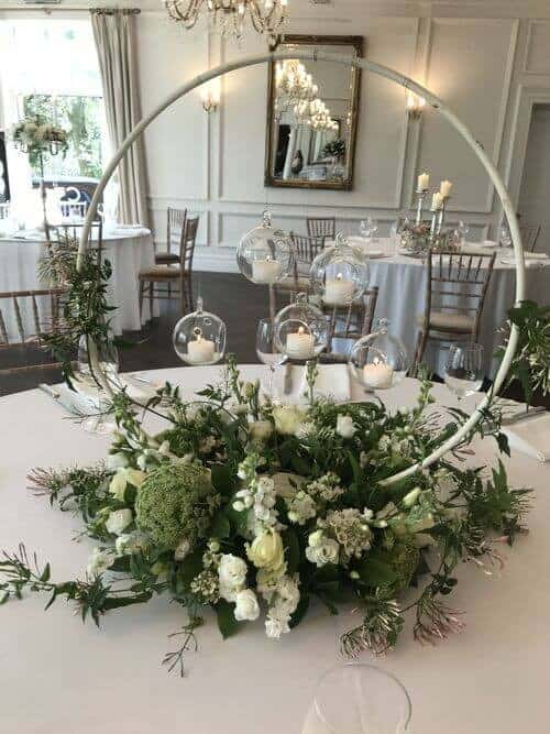 Hanging candles and greenery