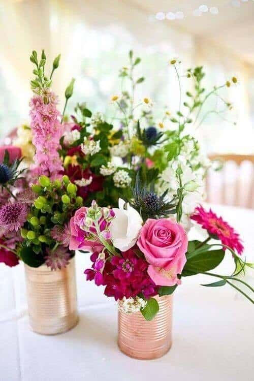 Pink roses and wildflower centerpieces