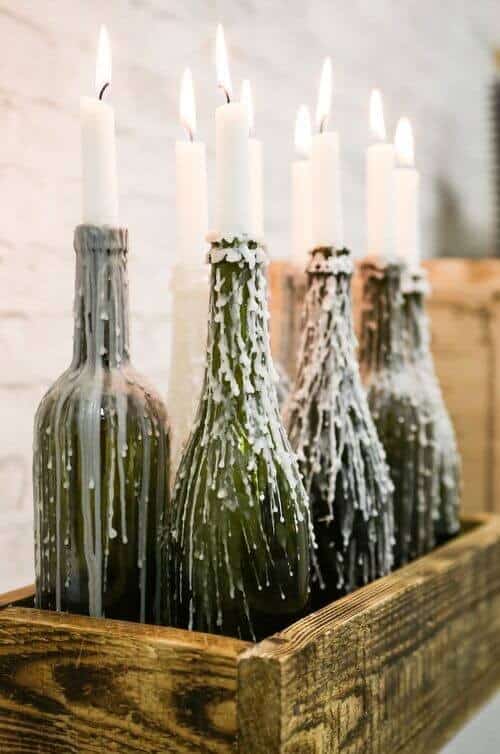 Candles in wine bottles