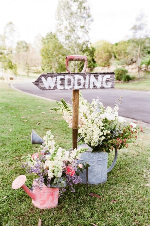 Watering cans and florals