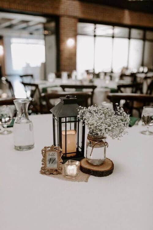 Simple mason jars wrapped in twine with lanterns