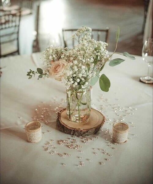 Wood circles, baby’s breath, and roses