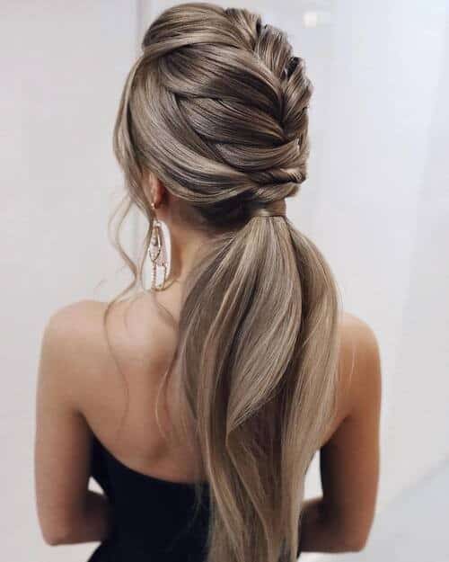 Low ponytail, half-braided style