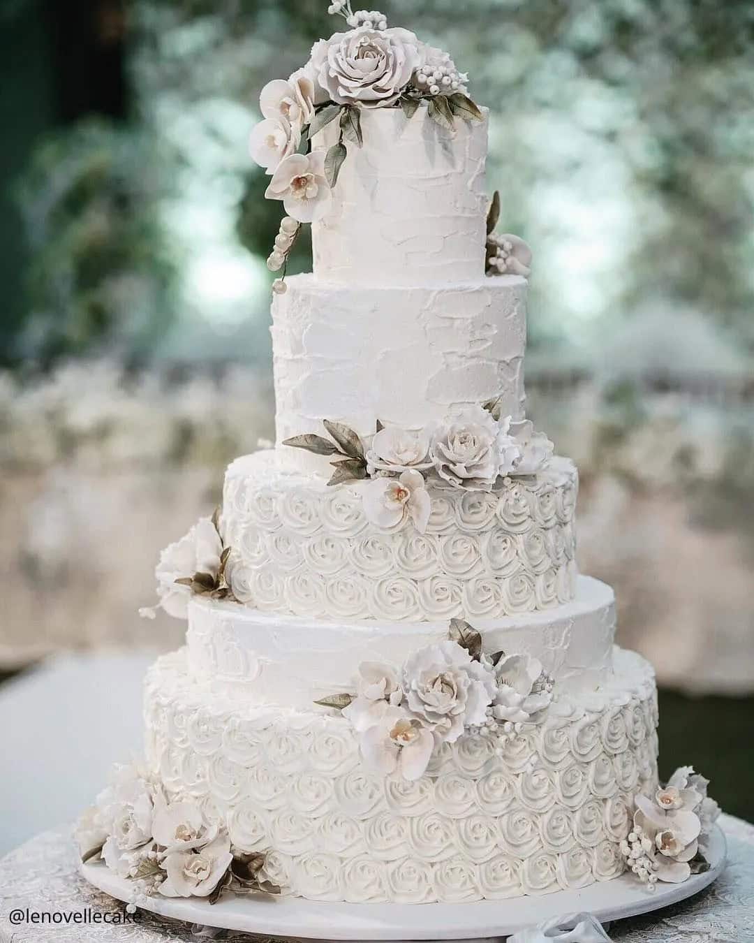 White Cakes With Flowers Decorations