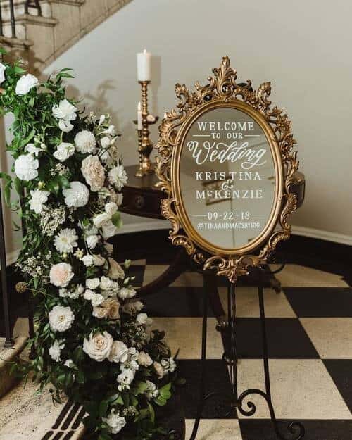 Vintage mirrors and overflowing flowers