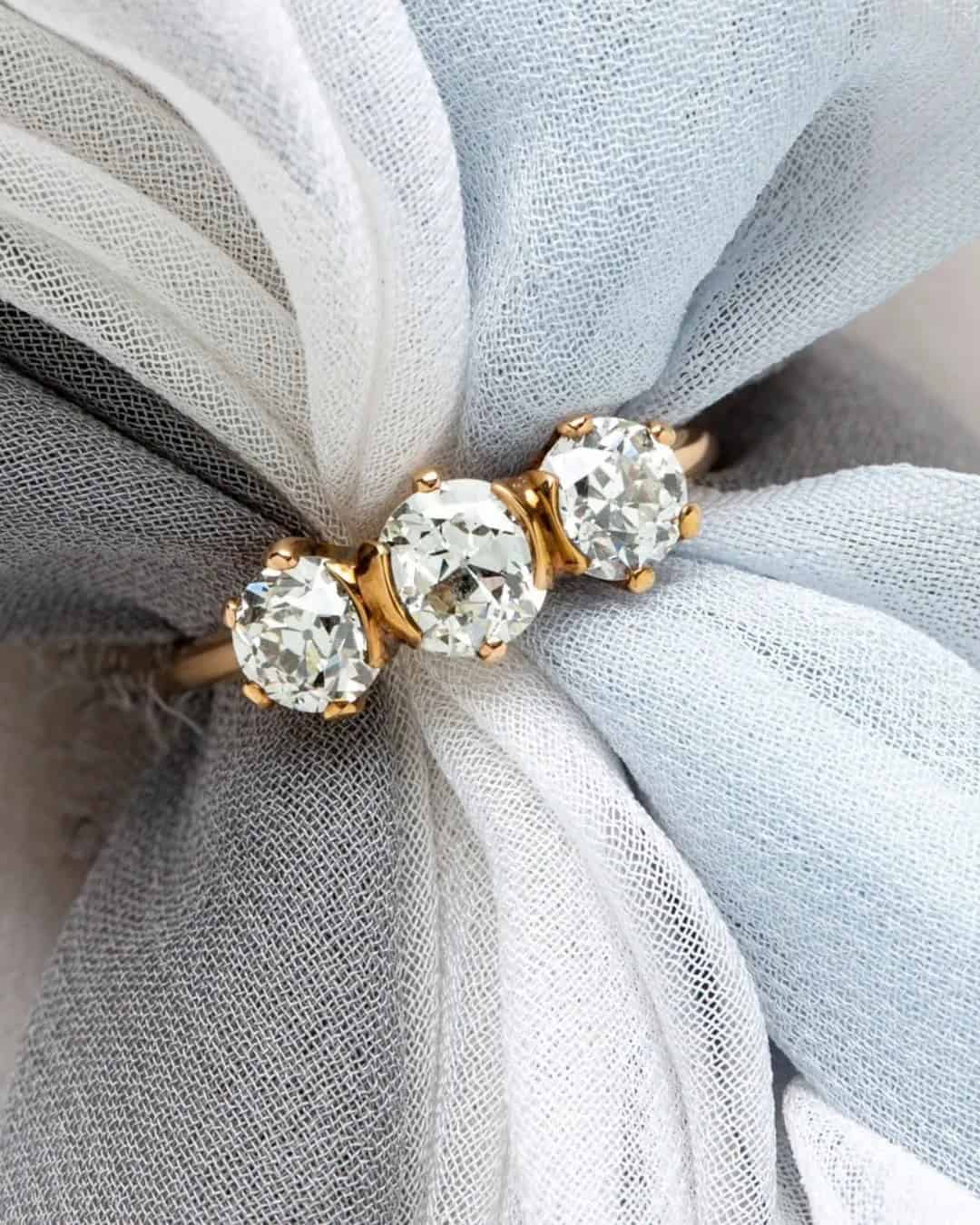 Round 3 Stone Engagement Rings