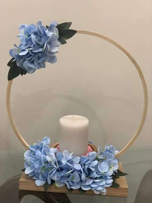 Gold-painted hoops and blue flowers