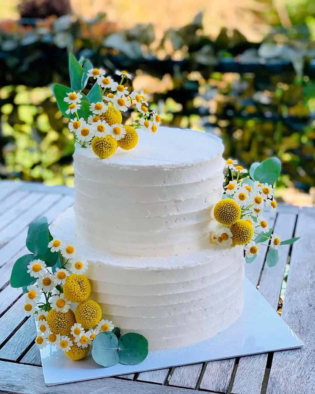 White Cakes With Flowers Decorations