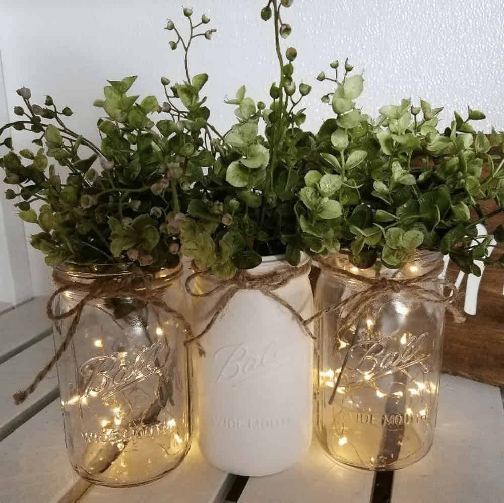 Eucalyptus and fairy lights in mason jars