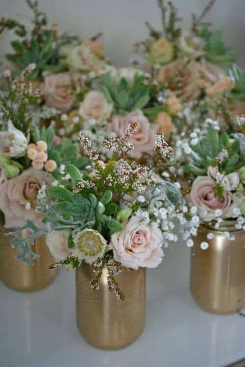 Greenery and rose centerpieces