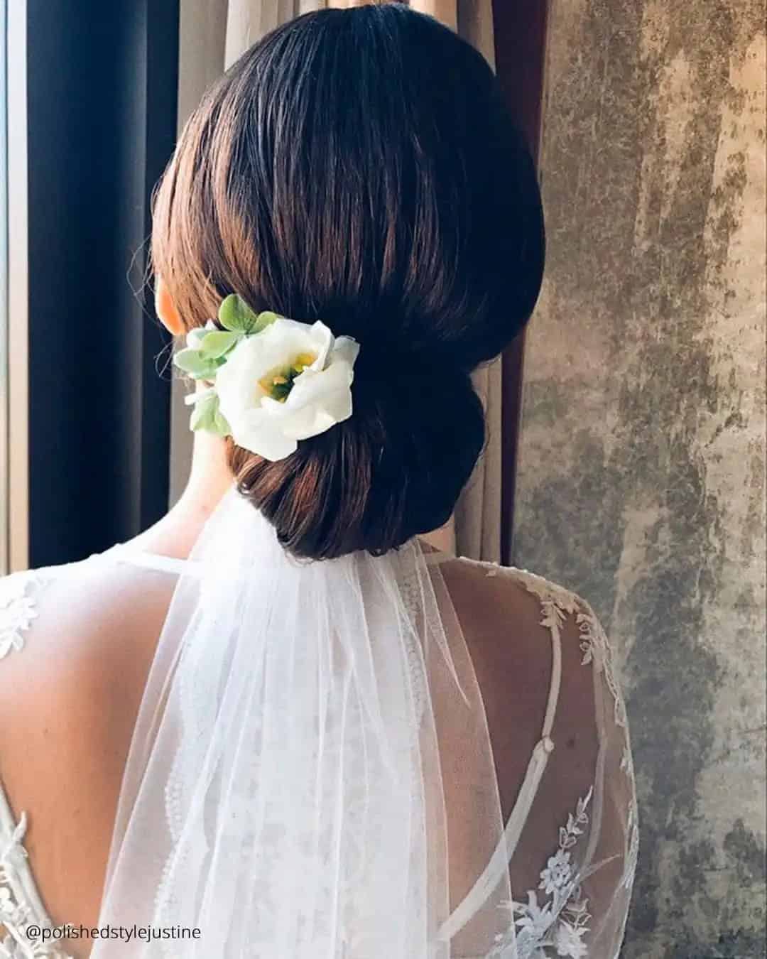 Bridal Look with Veil and Flowers