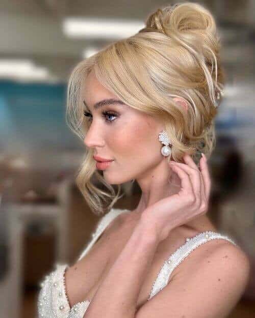 Classy Chignon Updo with Wavy Fringe