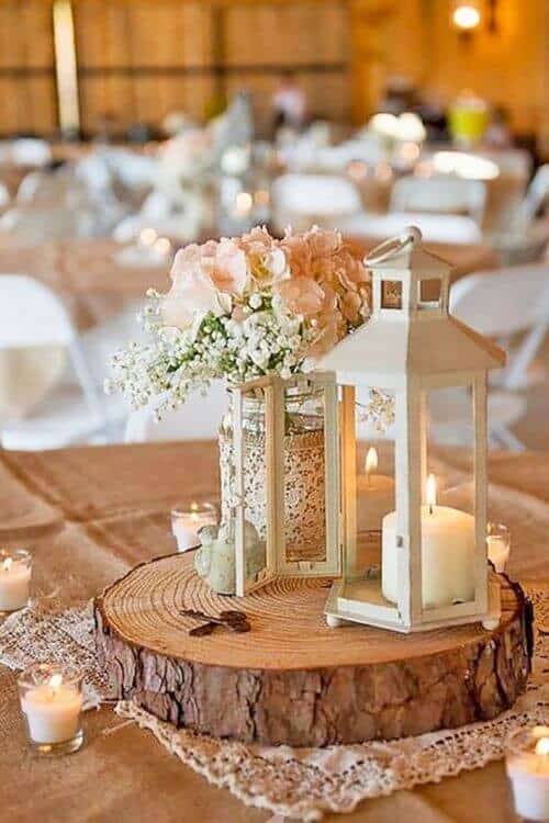 Rustic wood slices and white lanterns