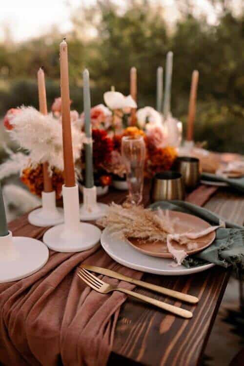 Orange, dusty pink, and green tableware