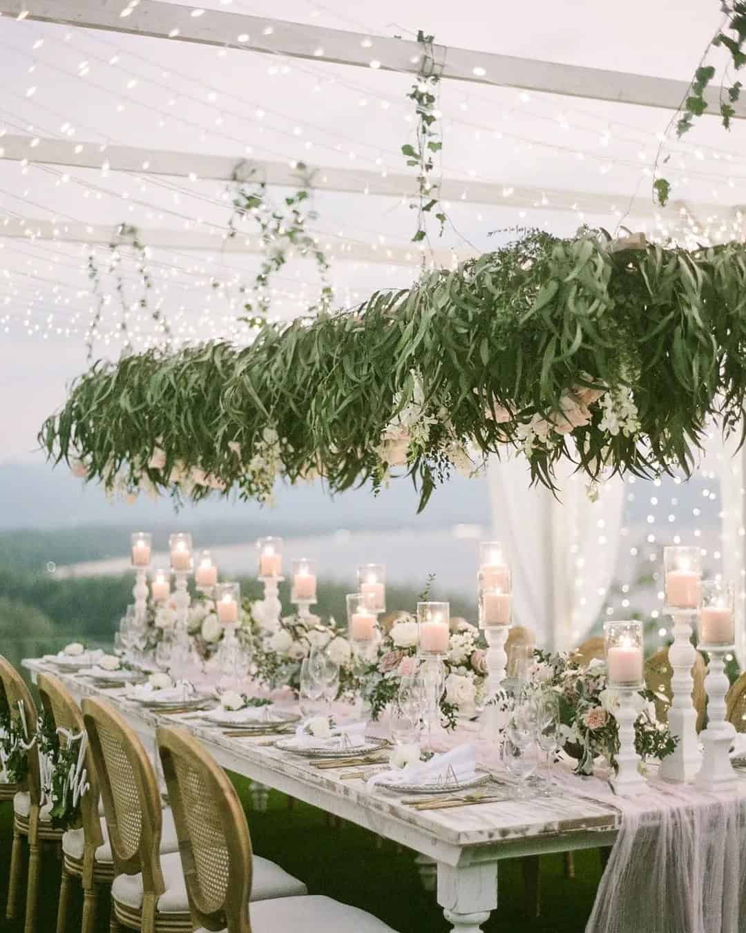 Wedding Tent Decorated With Natural Greenery