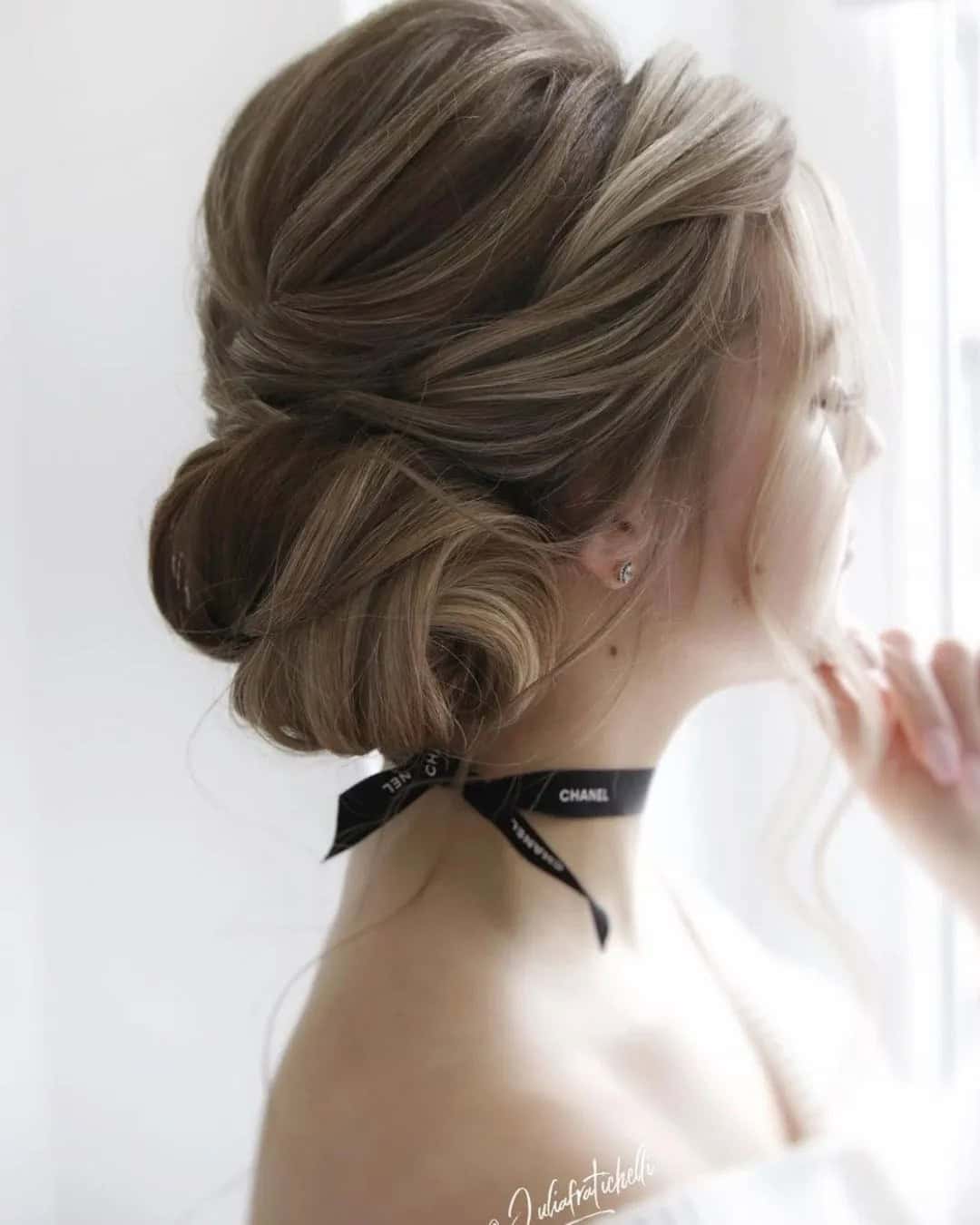 Loose Side Bun Wedding Hairstyles