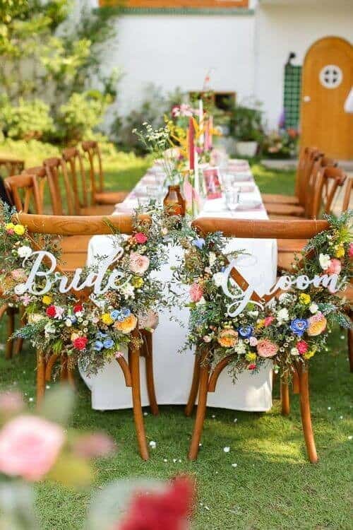 Bride and groom chair bouquets