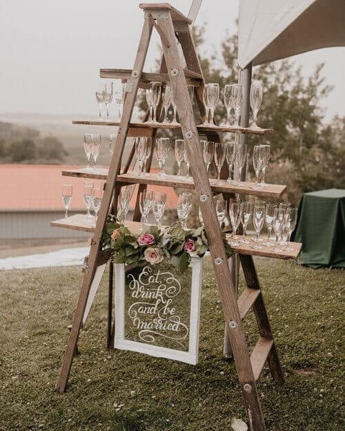 Using a ladder to serve drinks