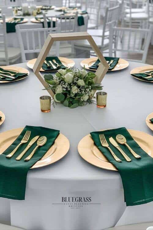 Gold and emerald place settings