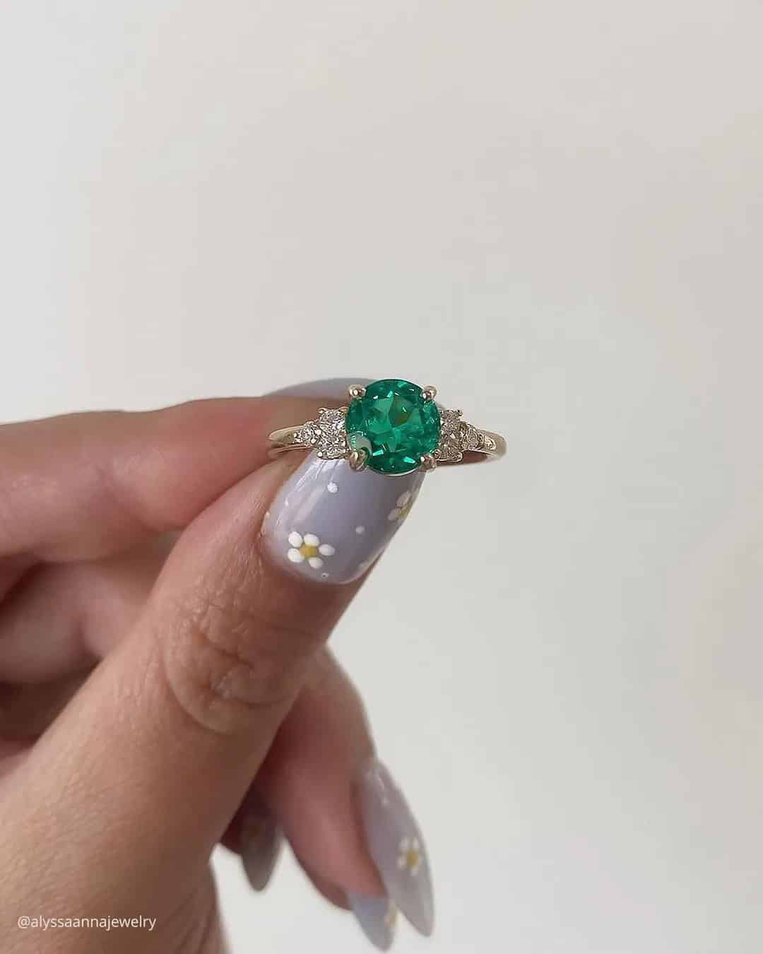 Round Cut Emerald Engagement Rings