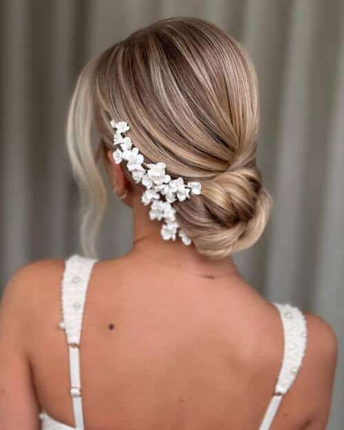 Low bun and floral bouquets