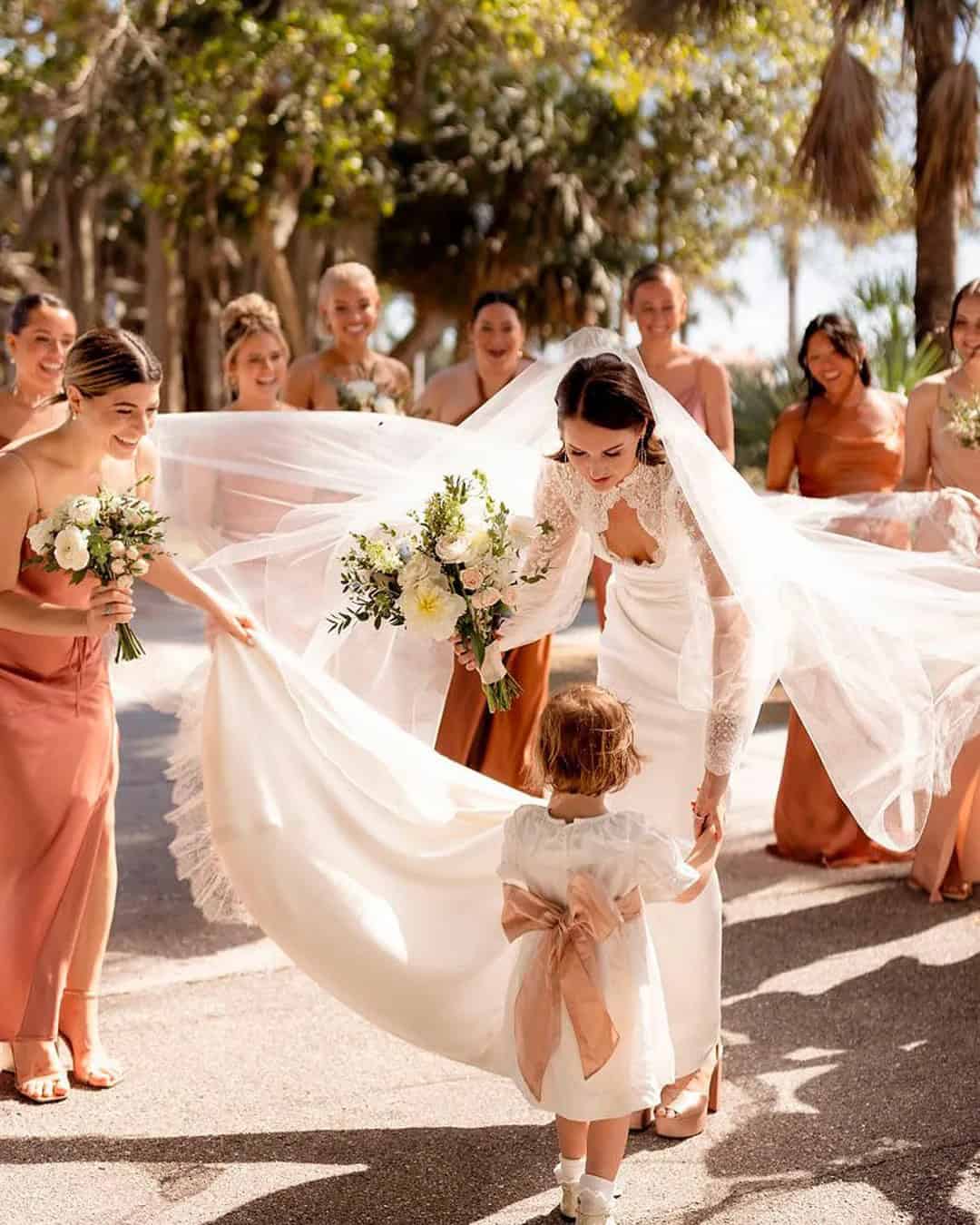 Bridesmaids With A Flower Girl