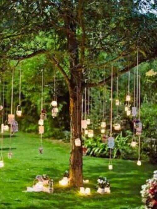 Hanging lanterns and mason jars with fake candles