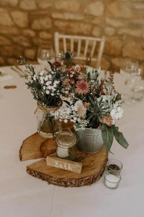 Wildflowers in tin buckets