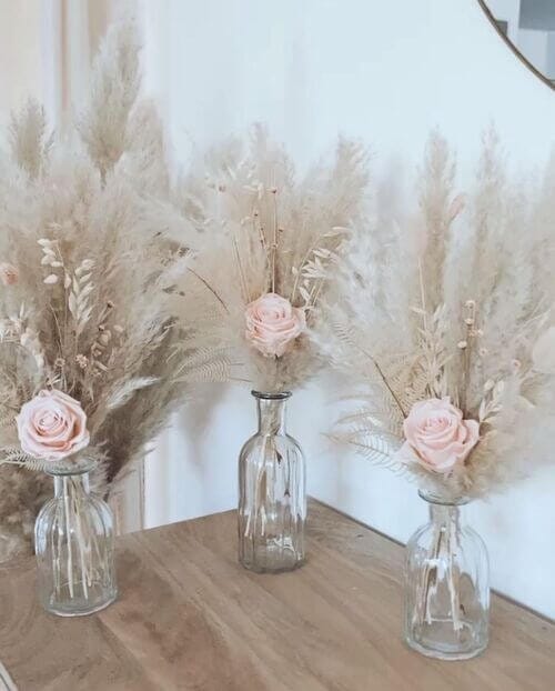 Pampas grass and white roses