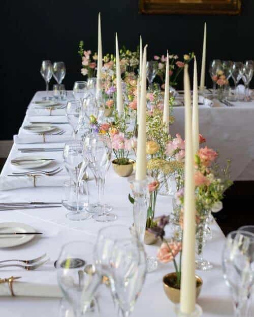 Candle sticks and wildflowers