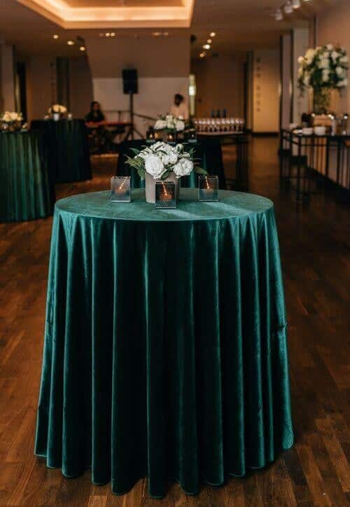 White, and emerald circular tables