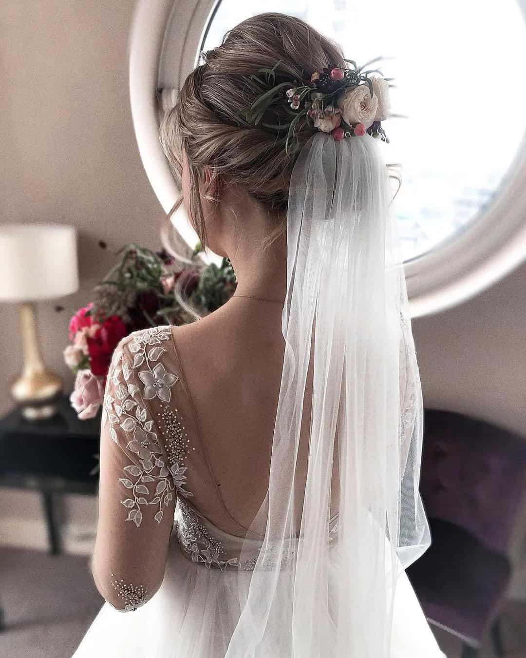 Bridal Look with Veil and Flowers