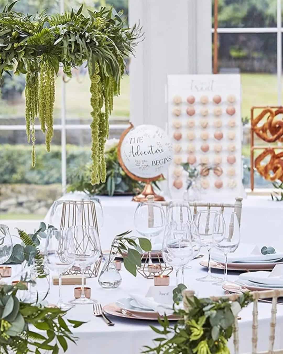 Greenery-themed dessert table