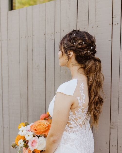 Low pony and side braid