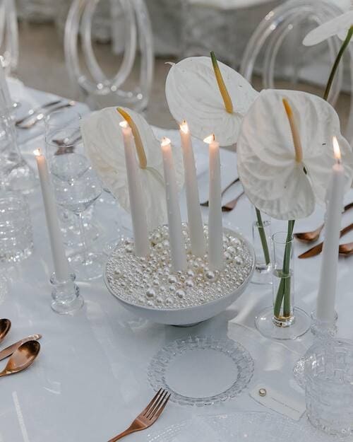 Candles and white pearls